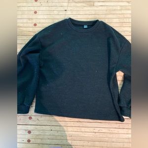 Women’s black sweater. Never worn. Size Medium or 6.